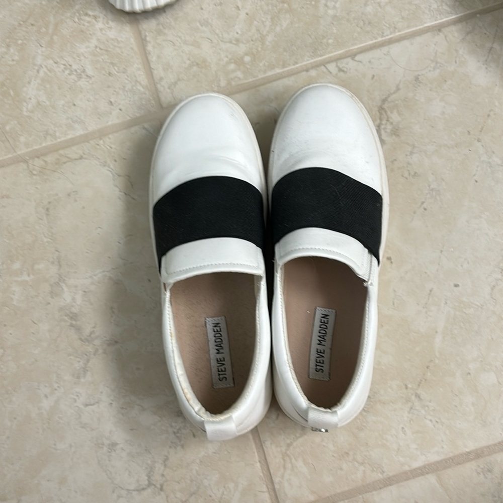 Steve Madden slip on white leather shoe; size 8.5